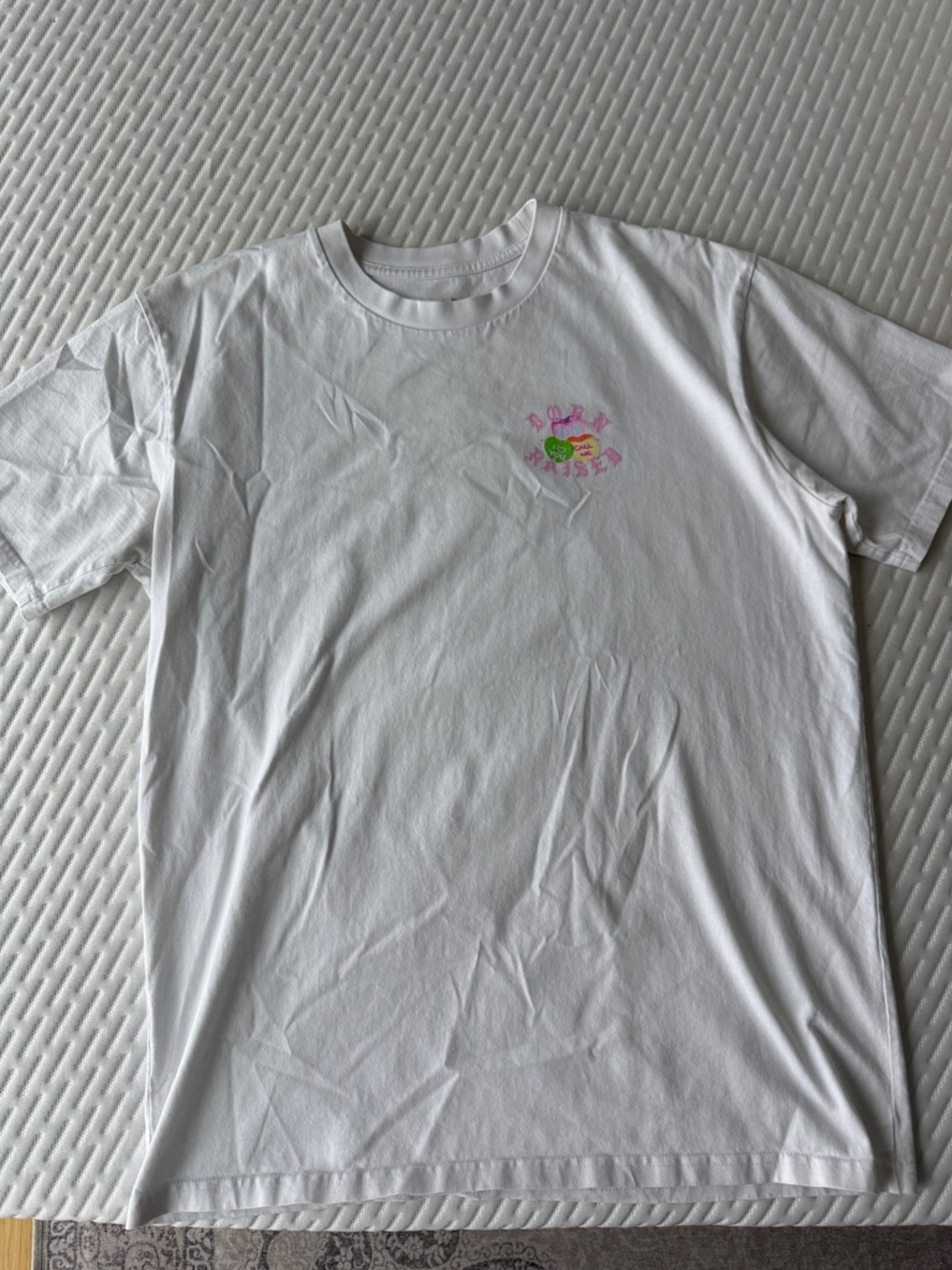 BORN X RAISED White Tee with Pink & Green Chest Graphic